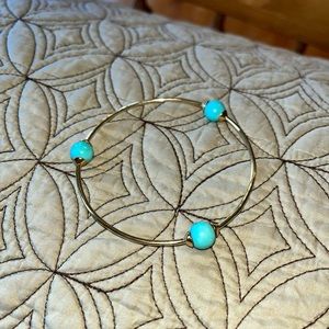 IPPOLITA 18K gold bracelet with 3 turquoise colored stones.